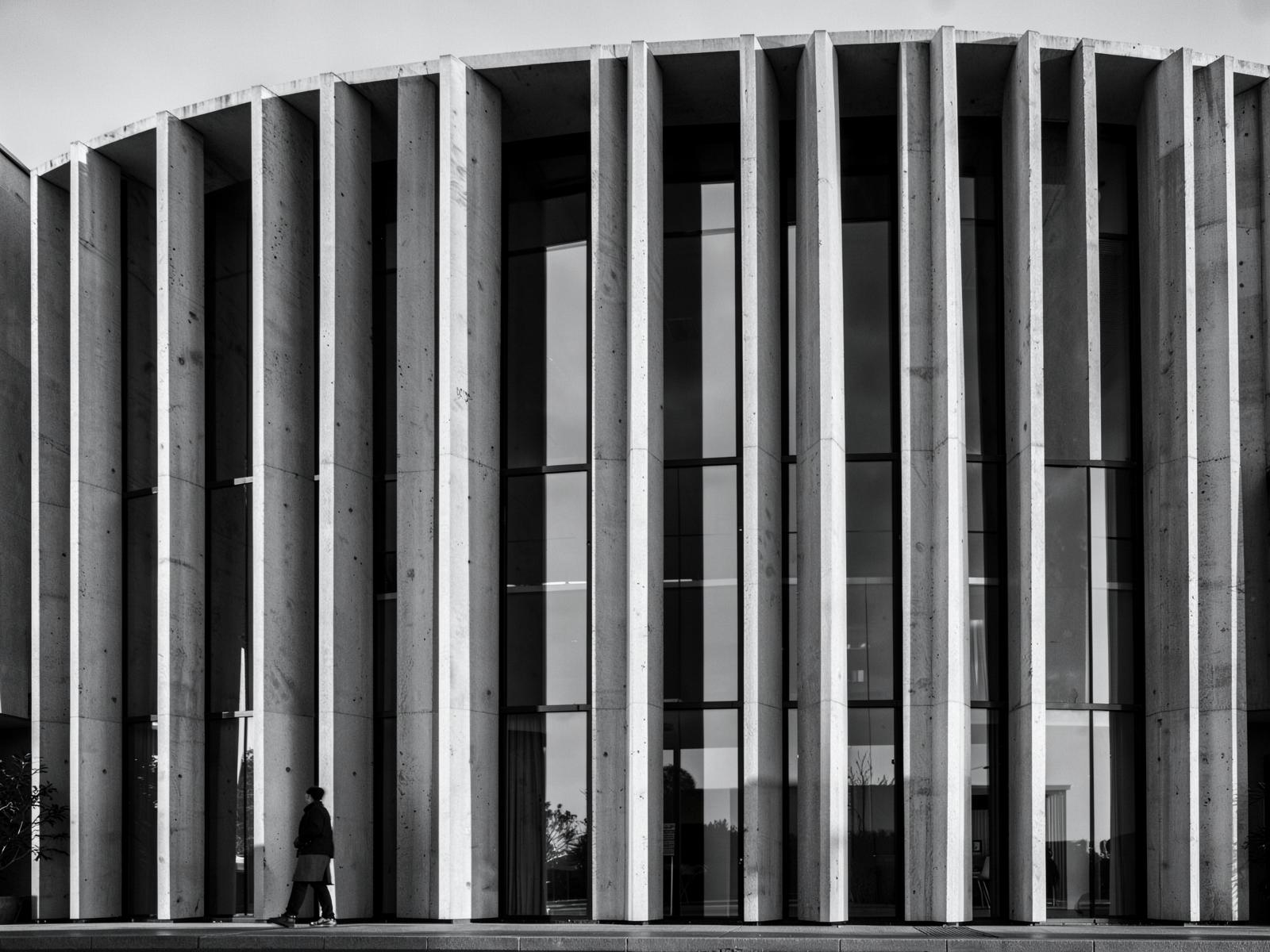 Climate-responsive concrete facade with deep shading fins
